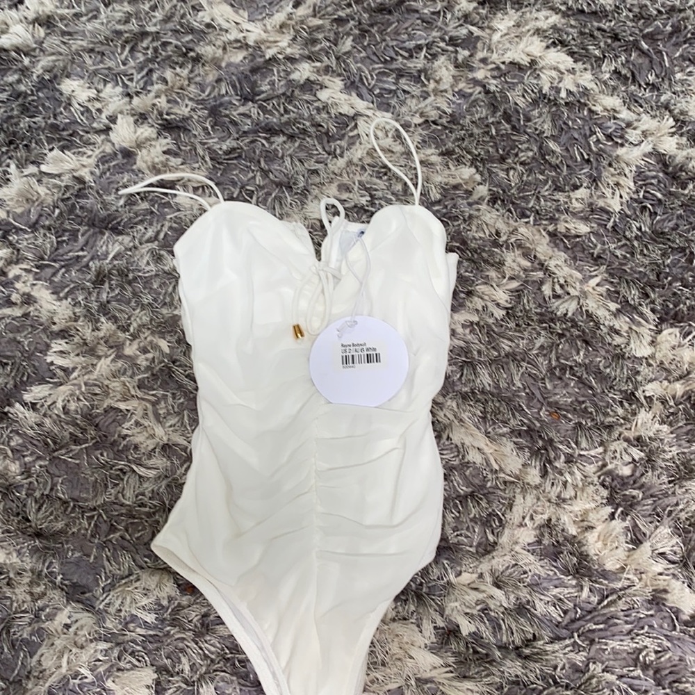 Princess Polly white, ruffled body suit